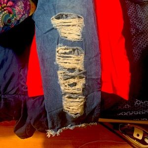 RIPPED JEANS FRONT AND BACK!! Not too light not too dark boot length